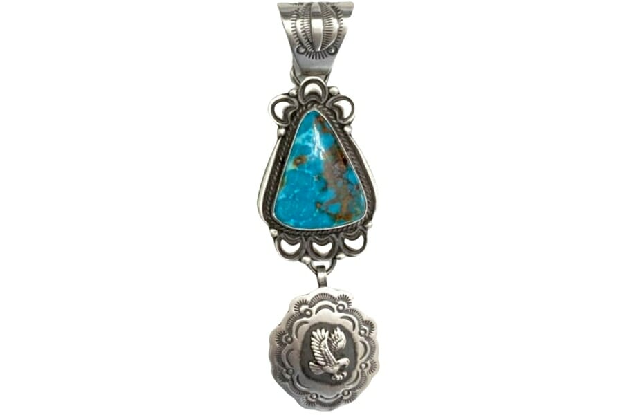 A gorgeous Bisbee turquoise necklace pendant with intricate details