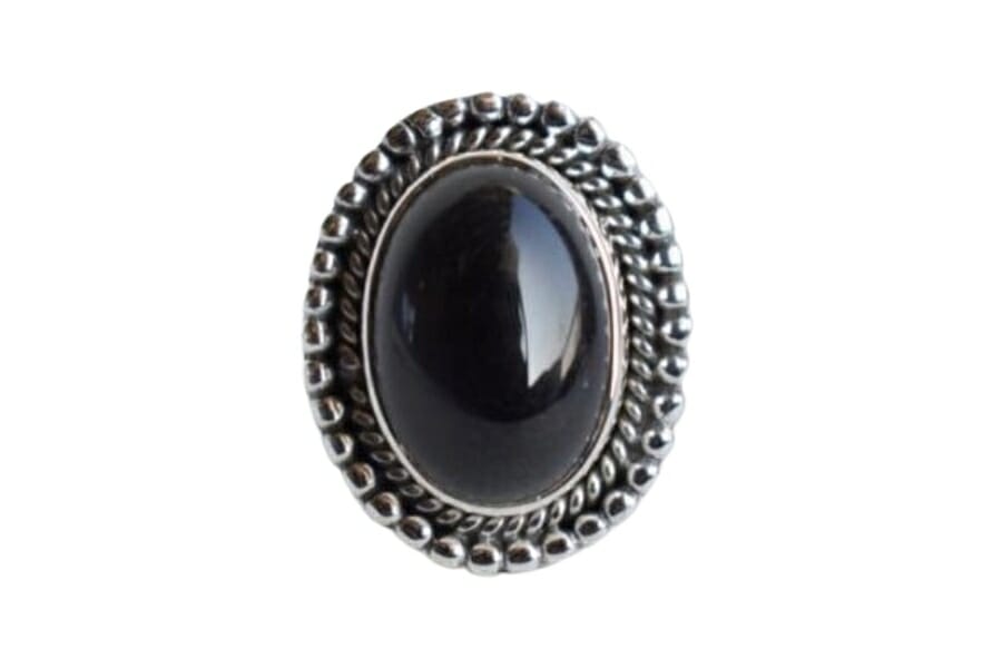An elegant large onyx ring with intricate patterns