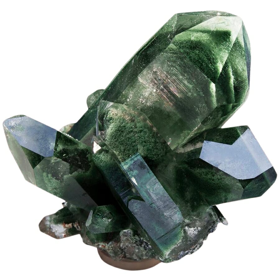 Glassy, transparent quartz showing green, leaf-like Chlorite inclusions