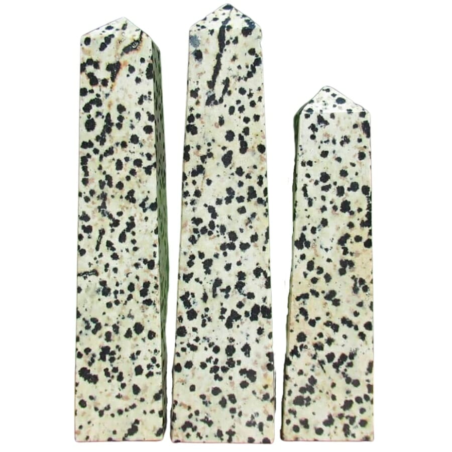Three Dalmatian stones cut and polished into obelisks