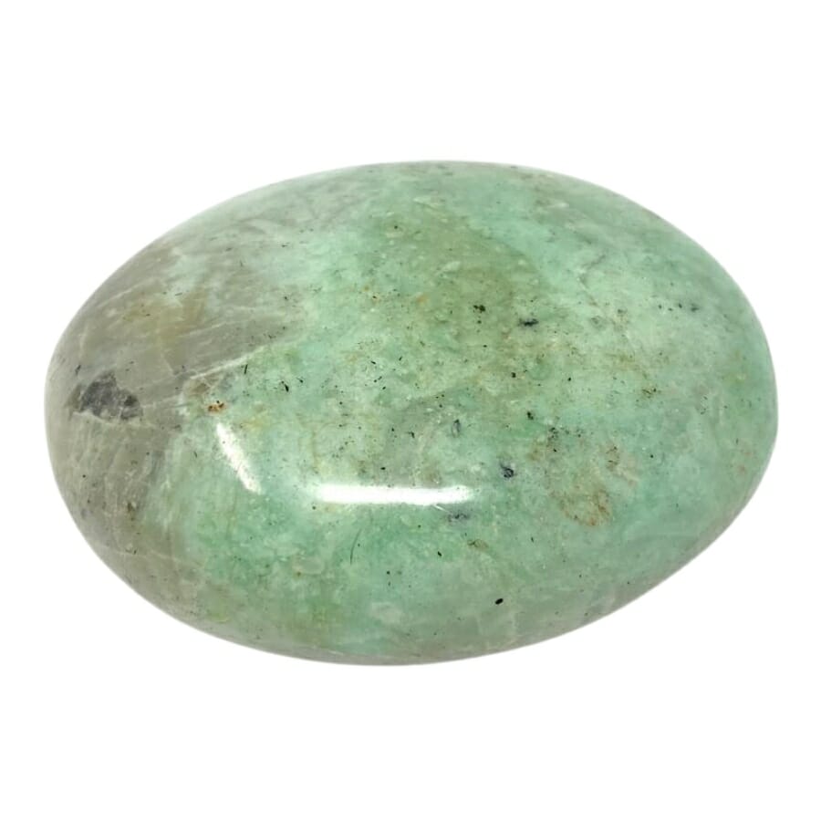 A tiny cute green moonstone pebble