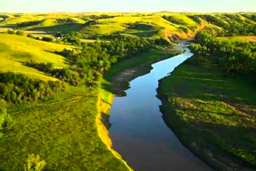 Aerial view of the Heart River showing its winding waters and surrounding greeneries