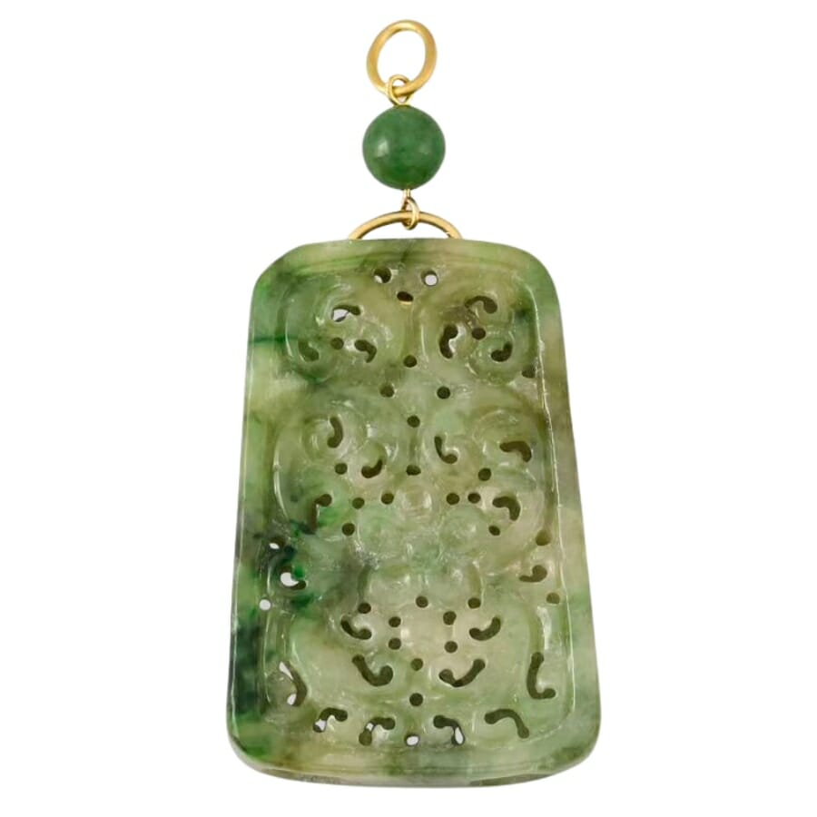 Intricately-carved white-green Jade pendant