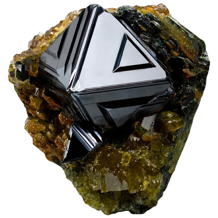 Black shiny magnetite specimen on a matrix