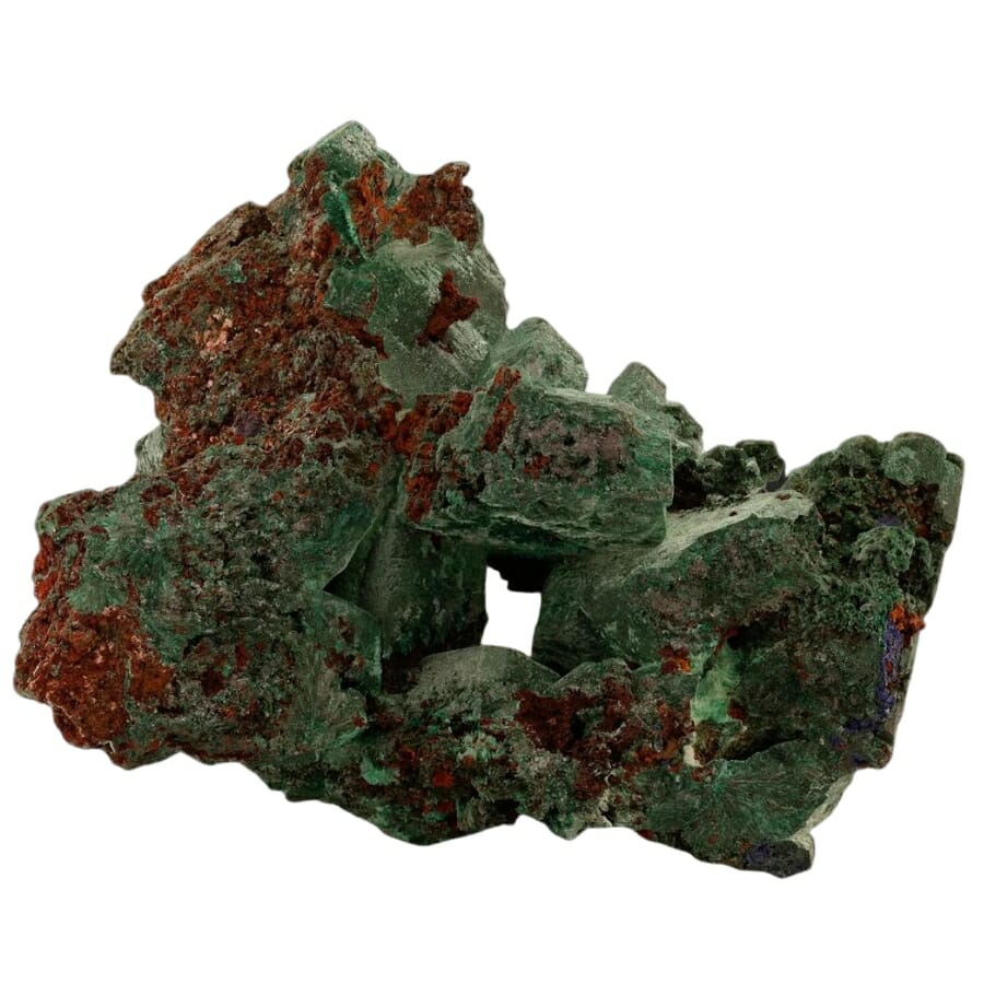 A super green malachite crystal with red hues on its surface