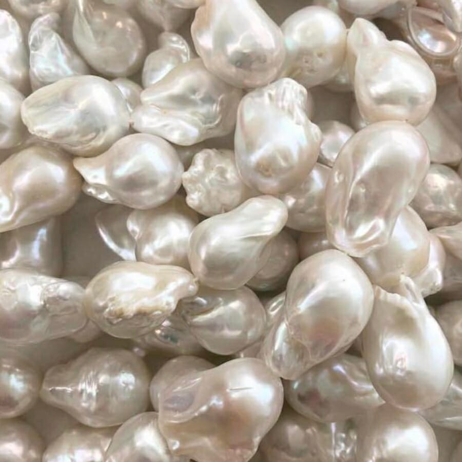 Shiny pieces of irregularly-shaped white pearls
