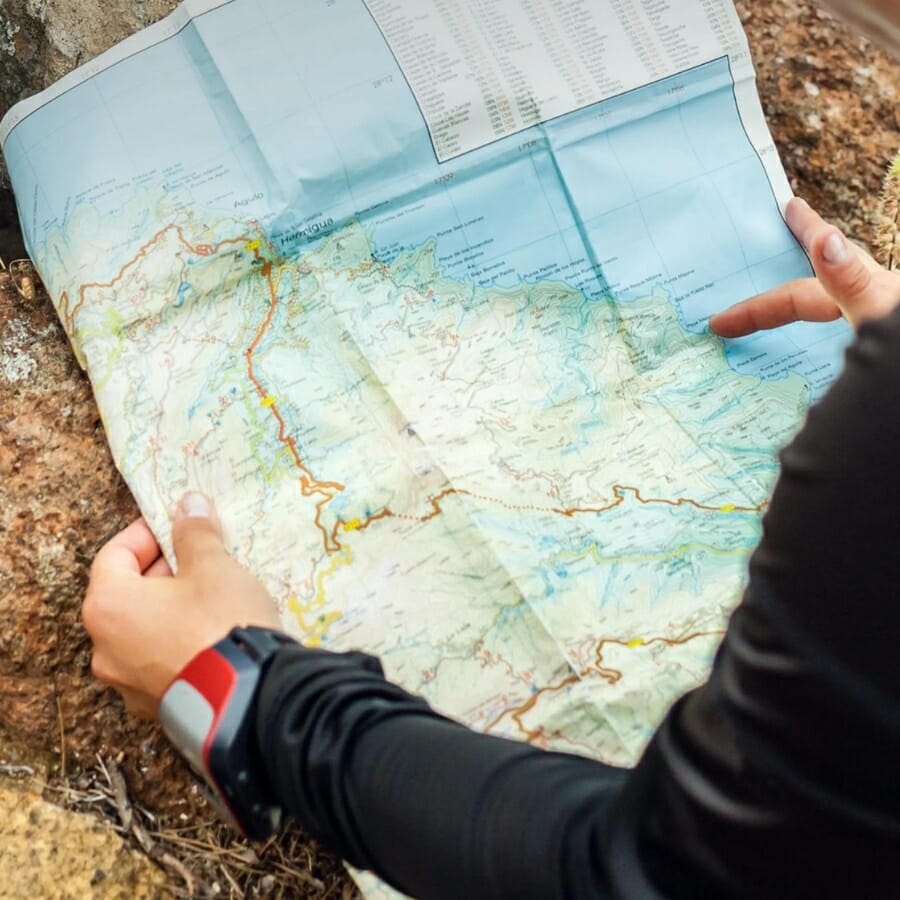 Reading geological maps and guides to identify rocks in a specific region