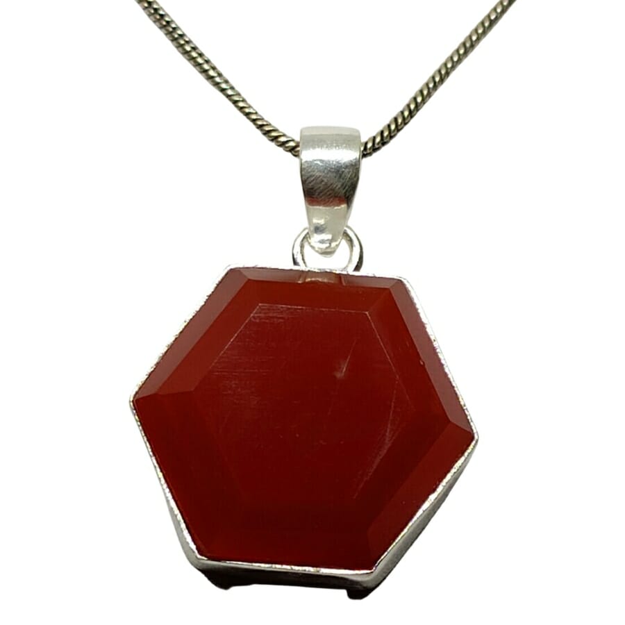 A unique red onyx hexagon necklace pendant