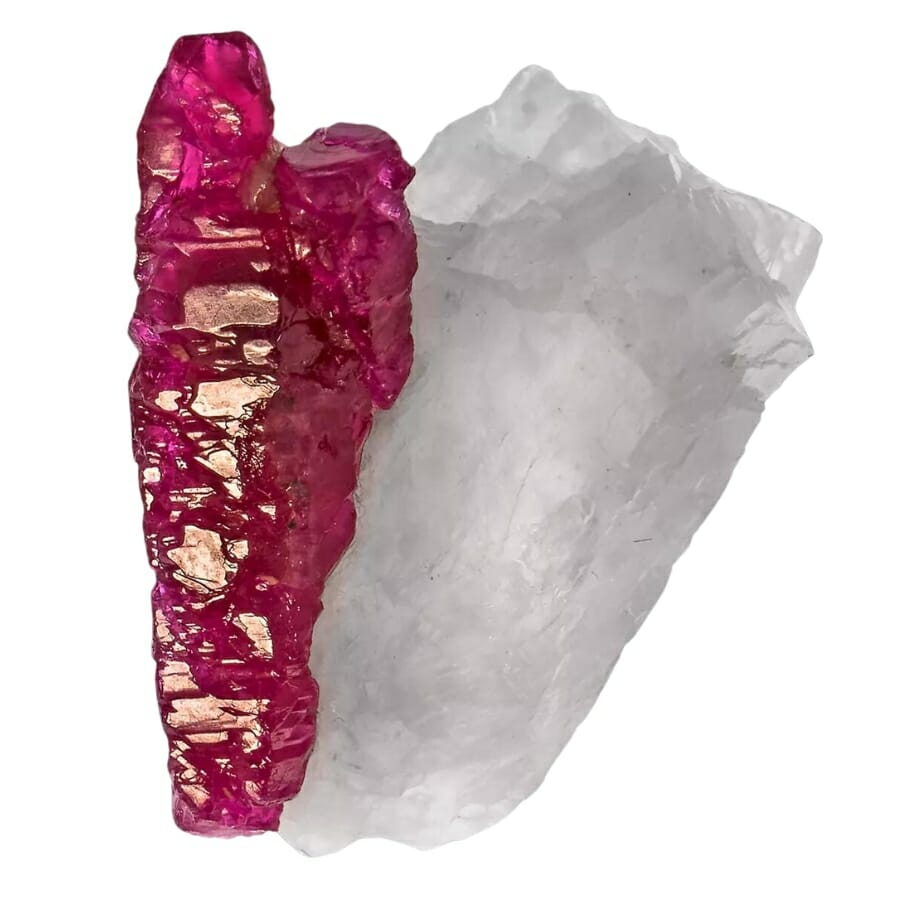 A pretty pinkish ruby with a milky white calcite attached to it
