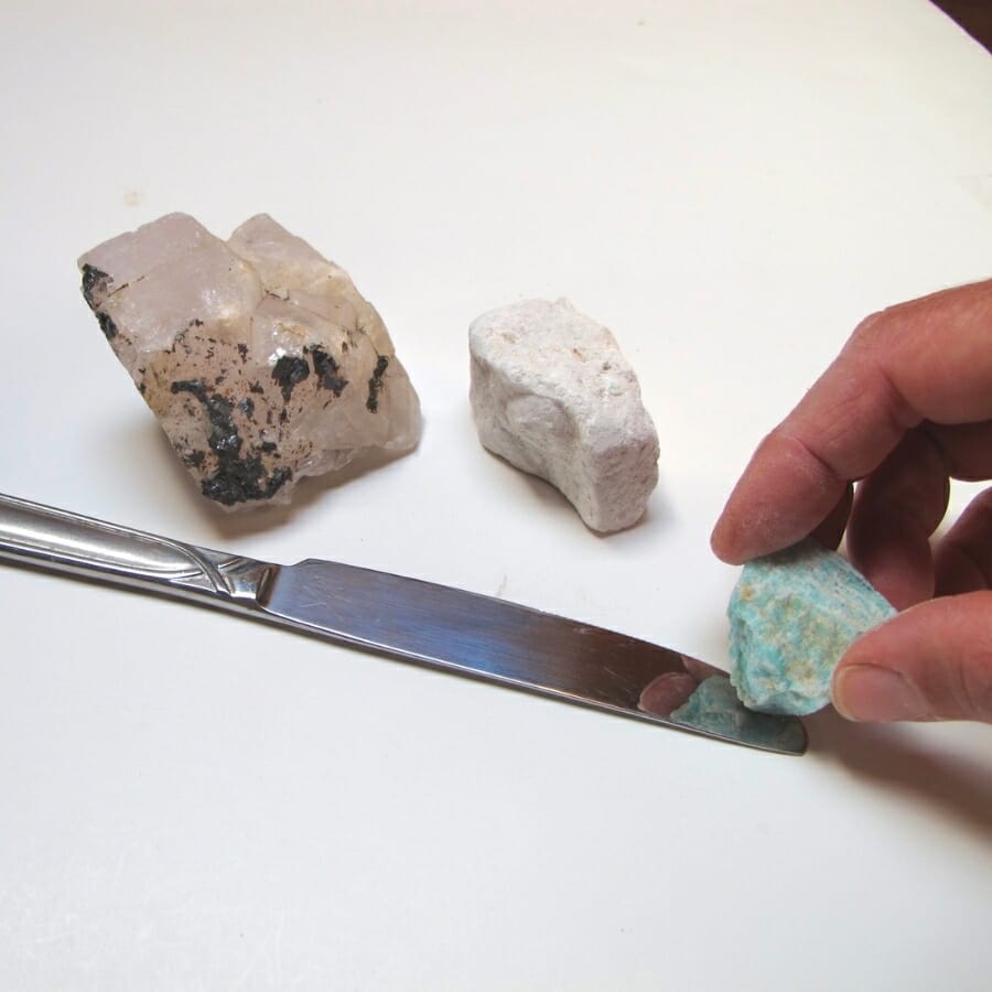 Different specimens being tested against a silver knife