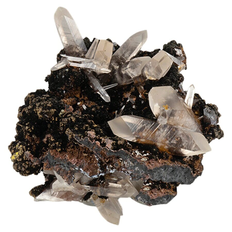 Crystals of smithsonite scattered around a brownish black mineral