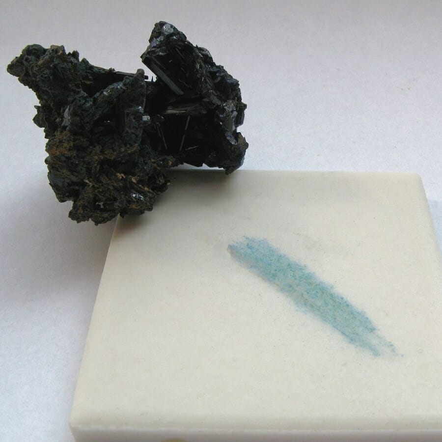 Streak test of a mineral on a porcelain tile