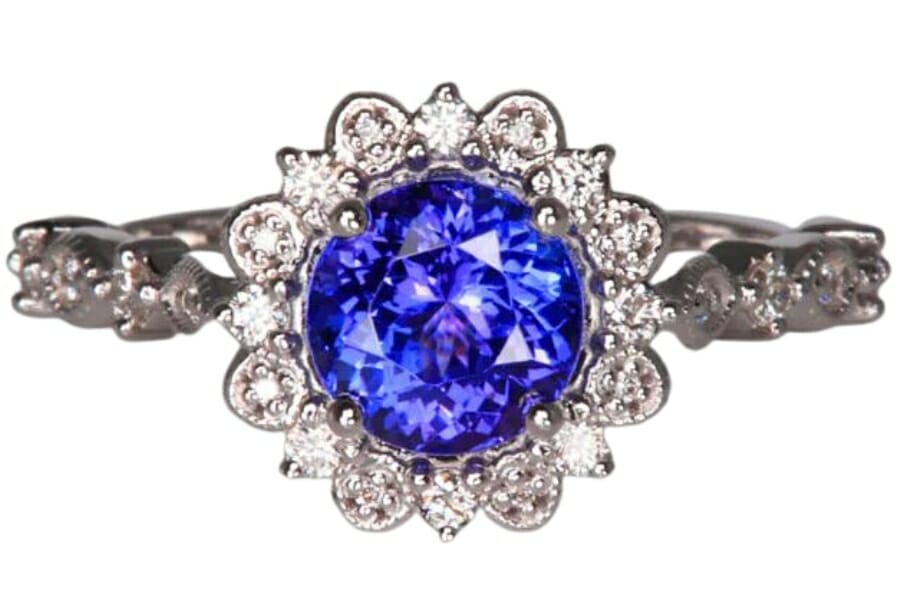A stunning round tanzanite ring surrounded by diamonds