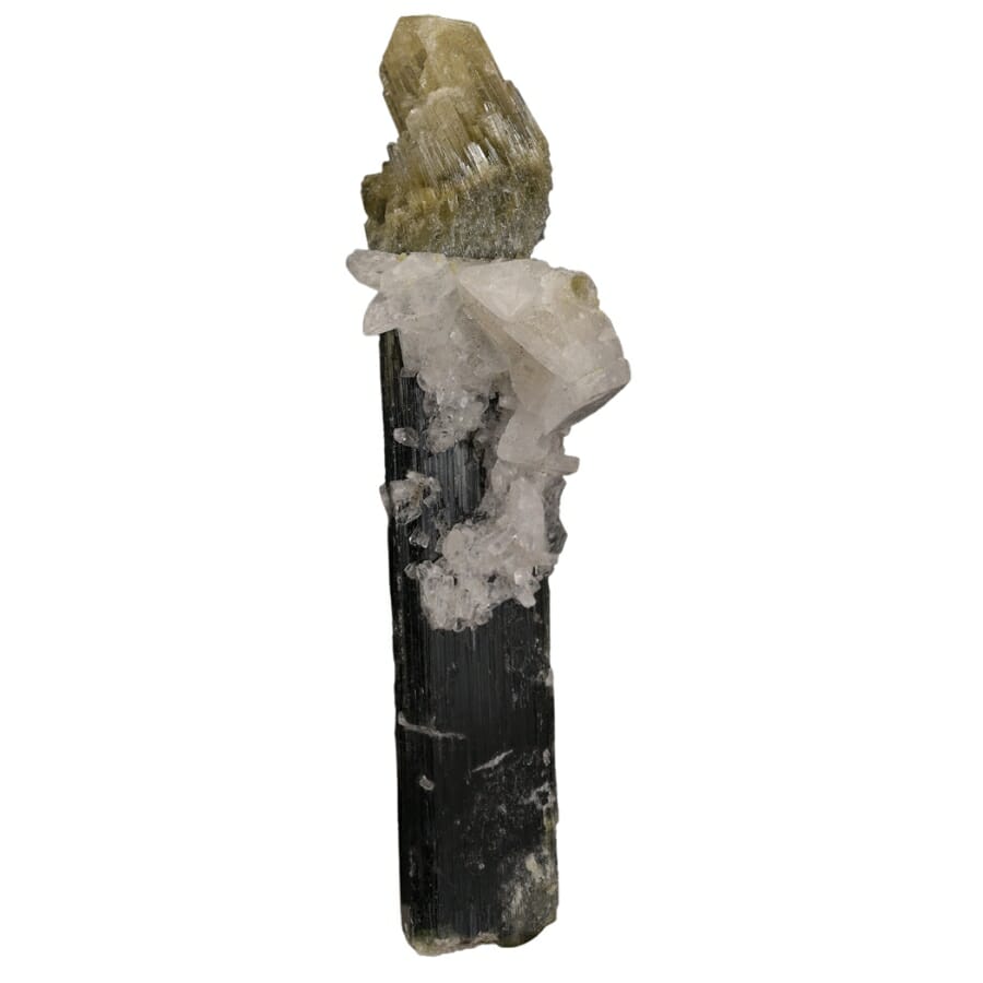 A distinct vertical tourmaline specimen that looks like a torch