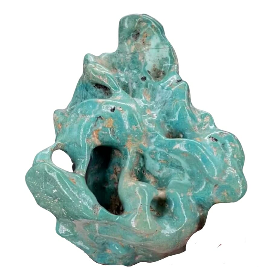 An astounding piece of turquoise gemstone with a shiny finish and distinct shape
