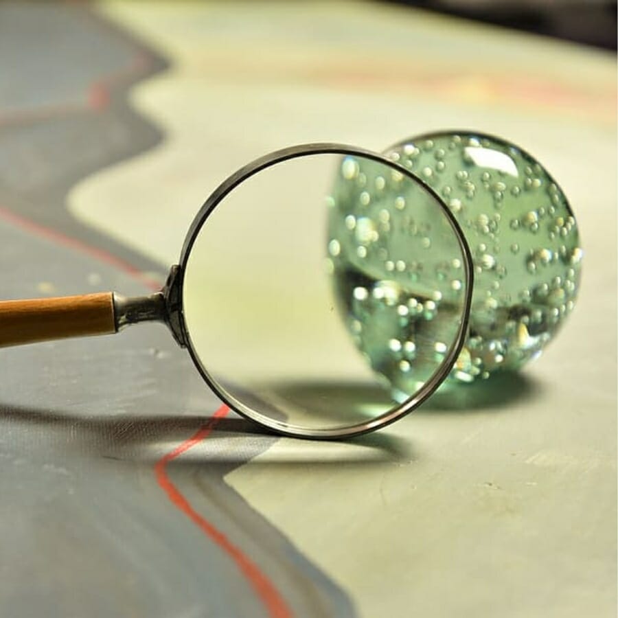 Inspecting a crystal's visual appearance using a magnifying glass