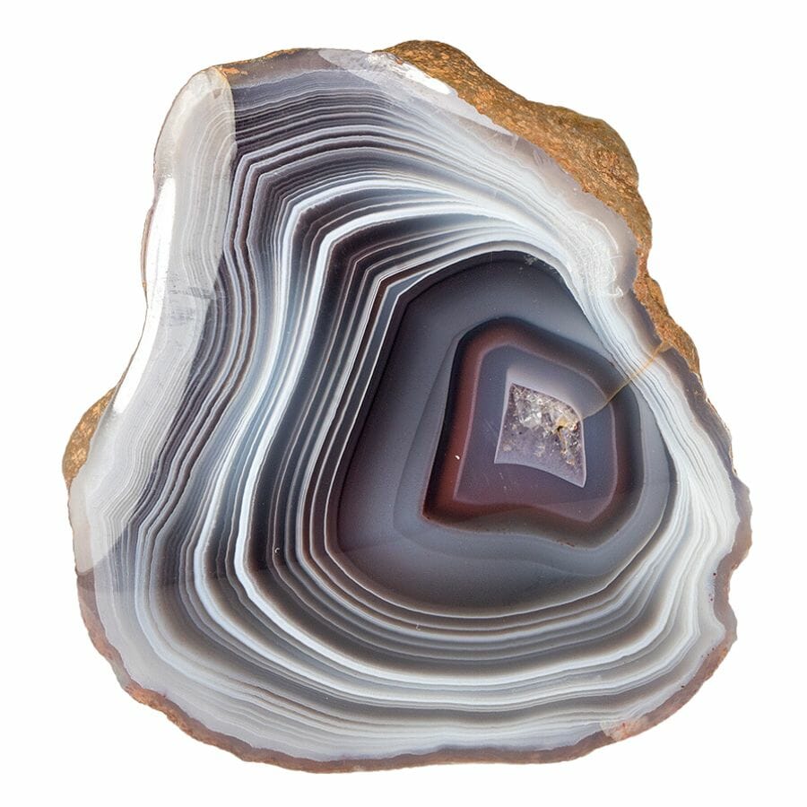 beautiful agate showing several layers in white, gray, and red