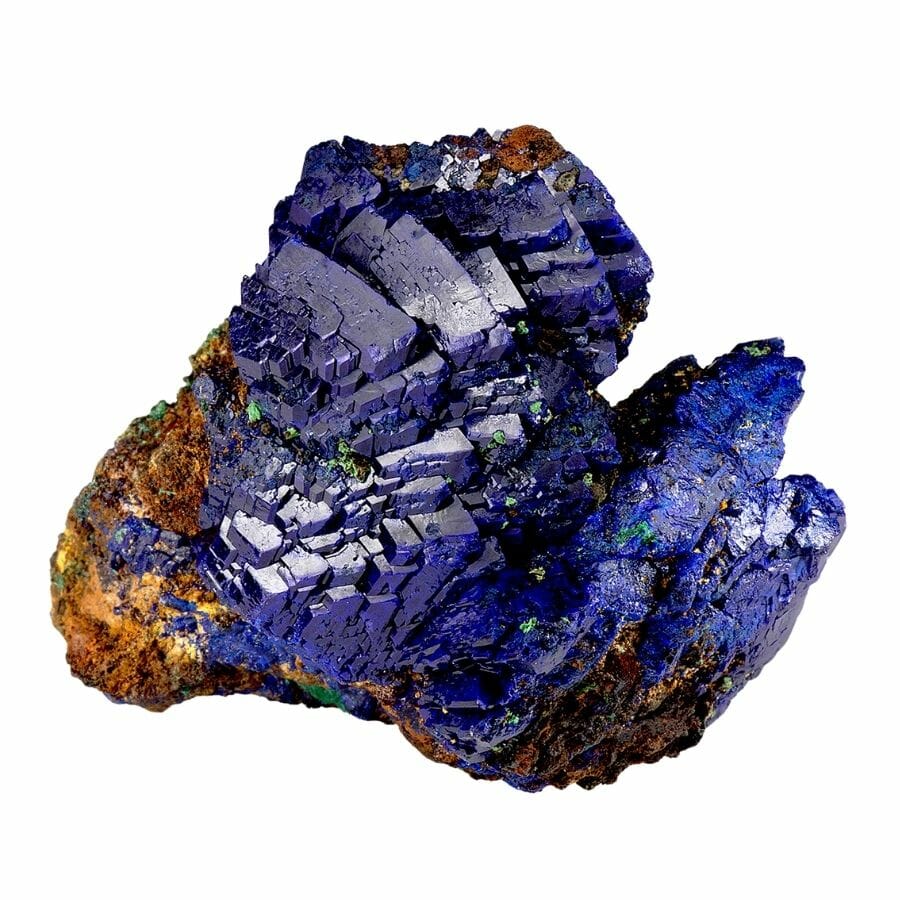 cluster of deep blue azurite crystals on a rock