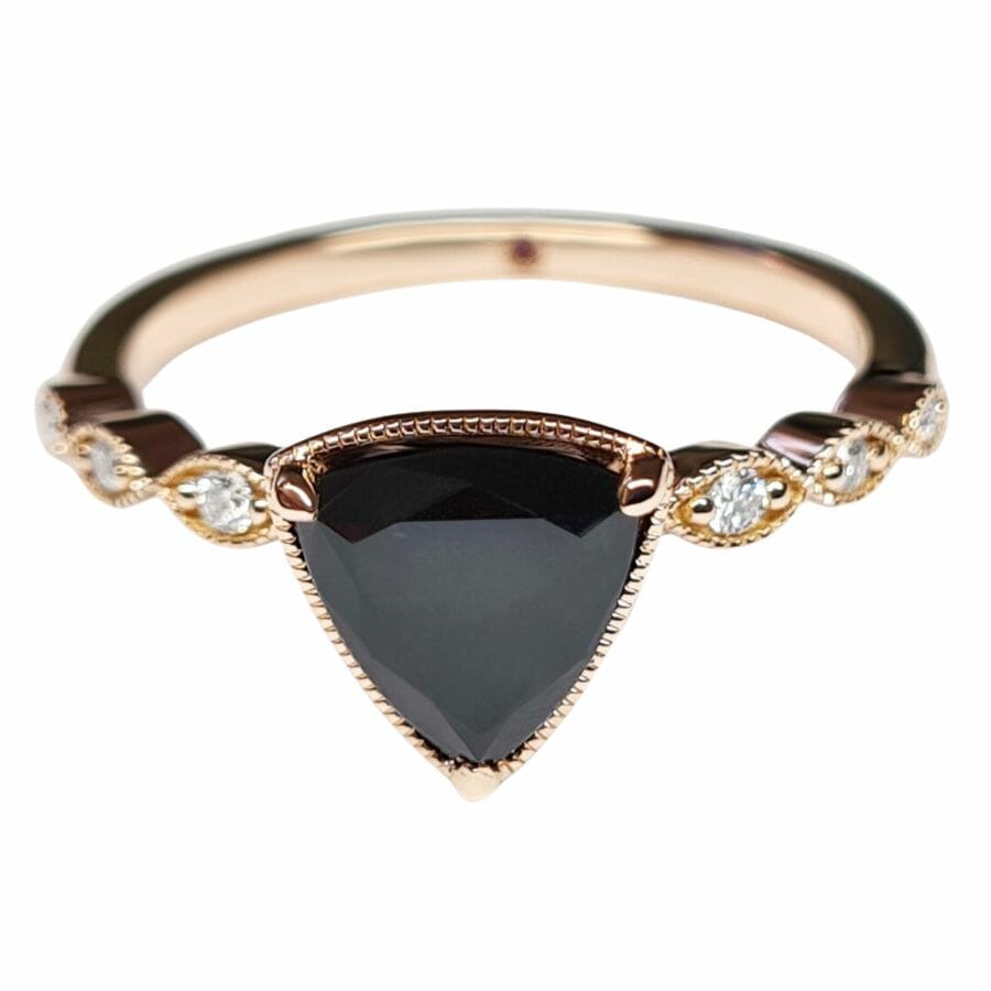 solitaire ring with black diamond in gold setting