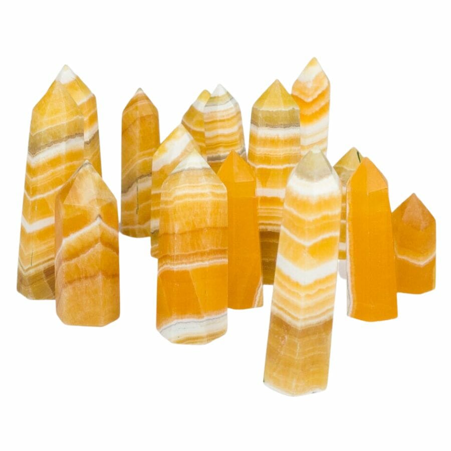 collection of orange calcite towers showing white and orange bands