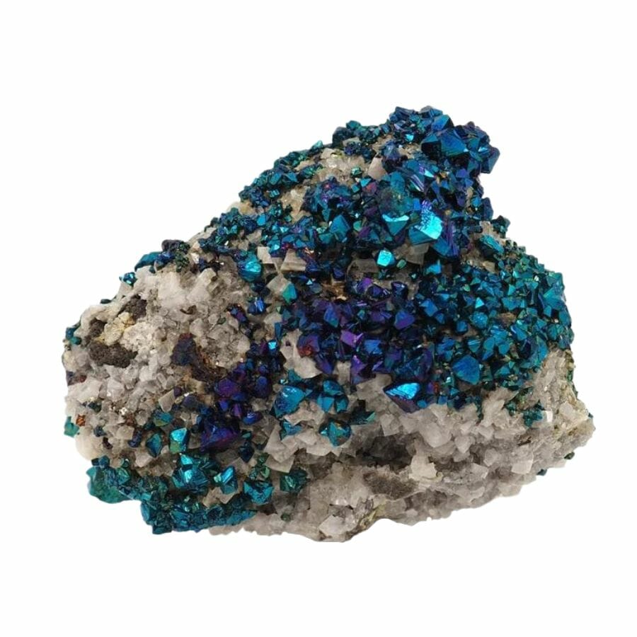 cubic blue and purple chalcopyrite crystals on a rock