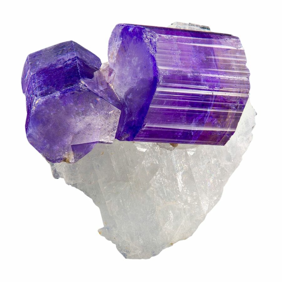 double terminated purple fluorapatite crystals on a matrix