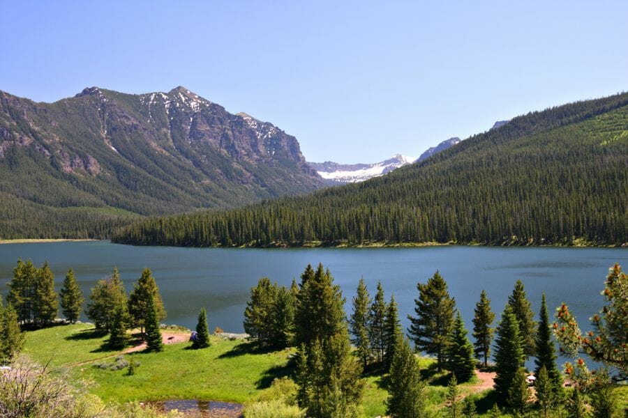 lake nestled in the gallatin national park, which houses the gallatin petrified forest