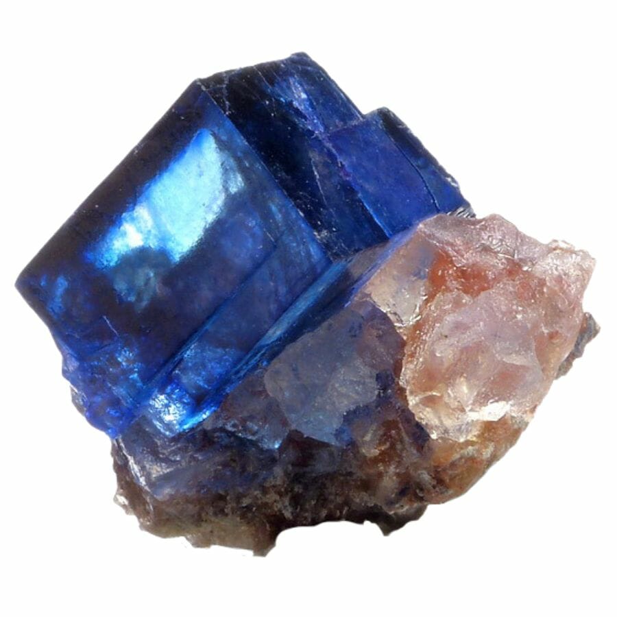 deep blue cubic halite crystal on sylvite