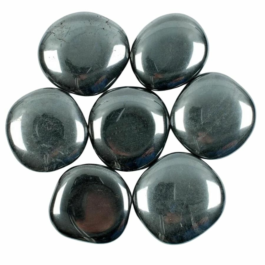 seven polished metallic hematite stones