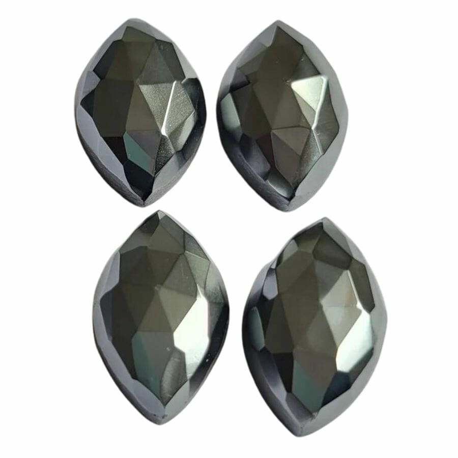 four faceted hematite cabochons