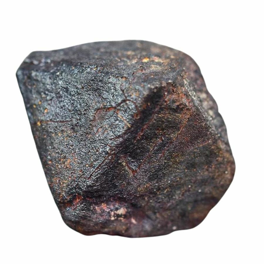 pointed reddish brown magnetite crystal