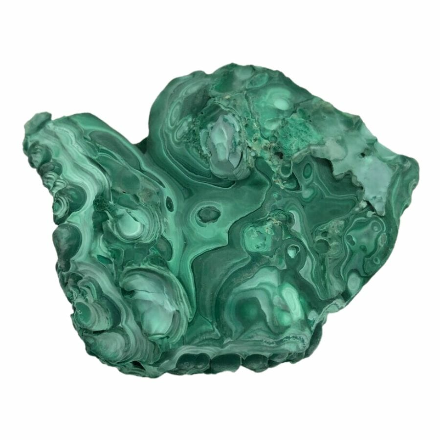 rough piece of bright green malachite showing layers and patterns in different green hues