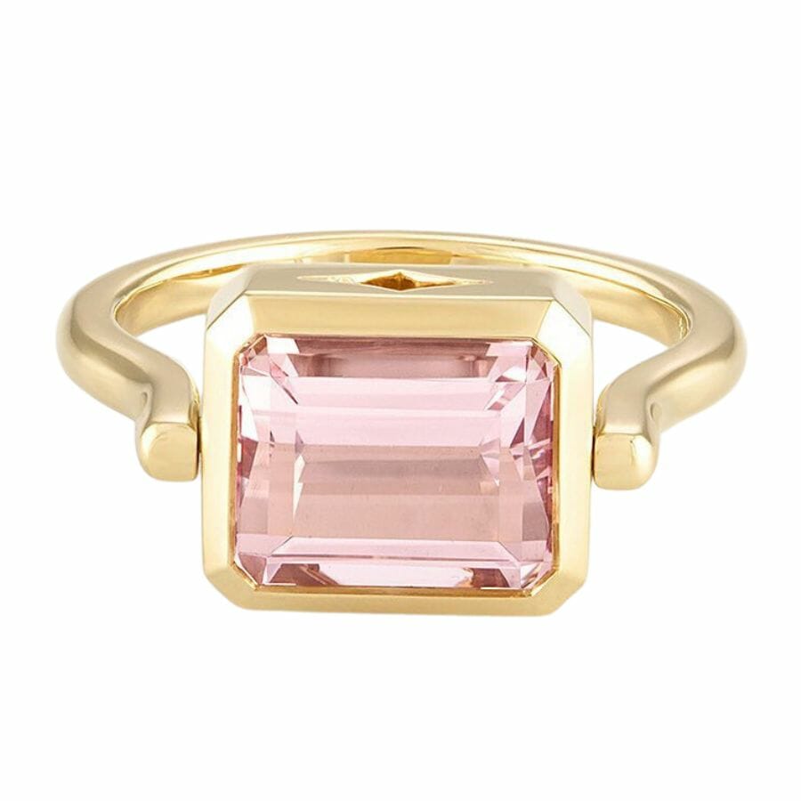 gold solitaire ring with emerald cut peach-pink morganite stone