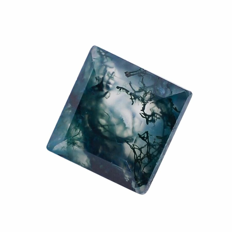 square cut moss agate with translucent base and dark green mossy patterns