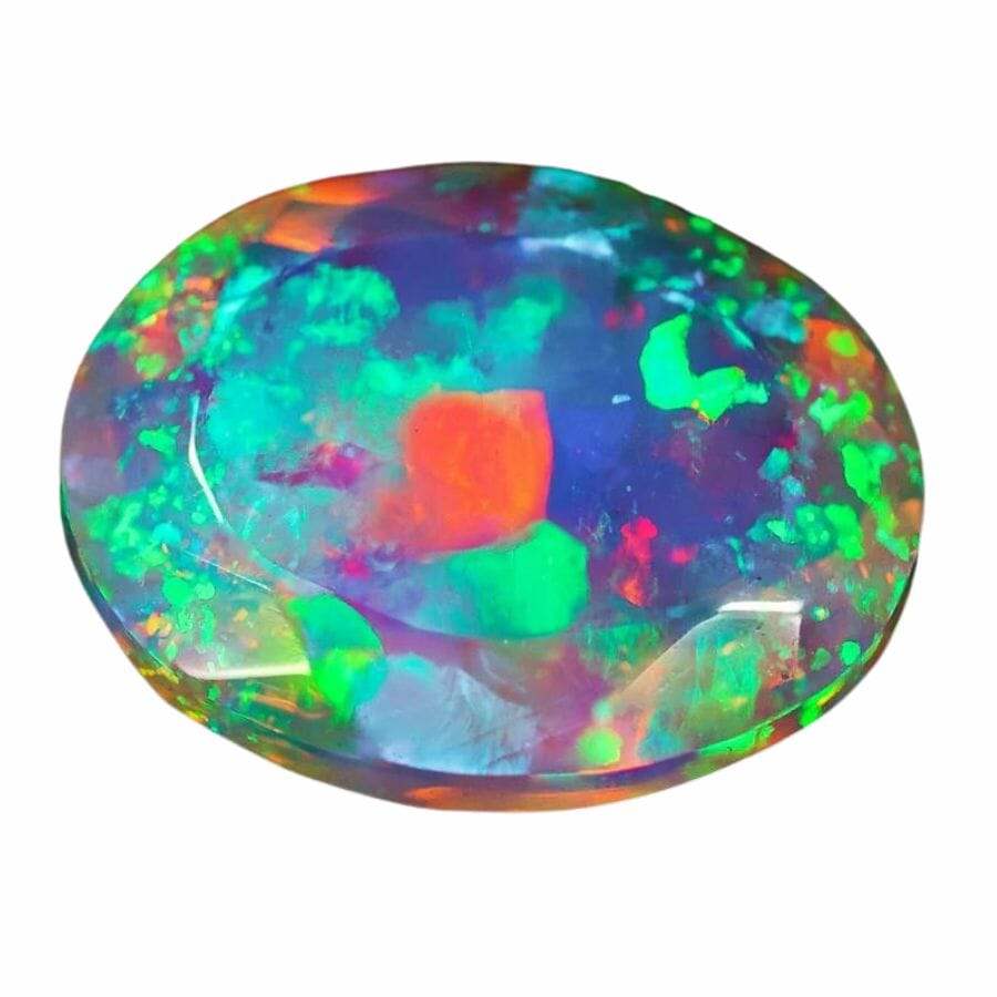 oval faceted opal with play-of-color that includes greem, blue, red, yellow, and purple