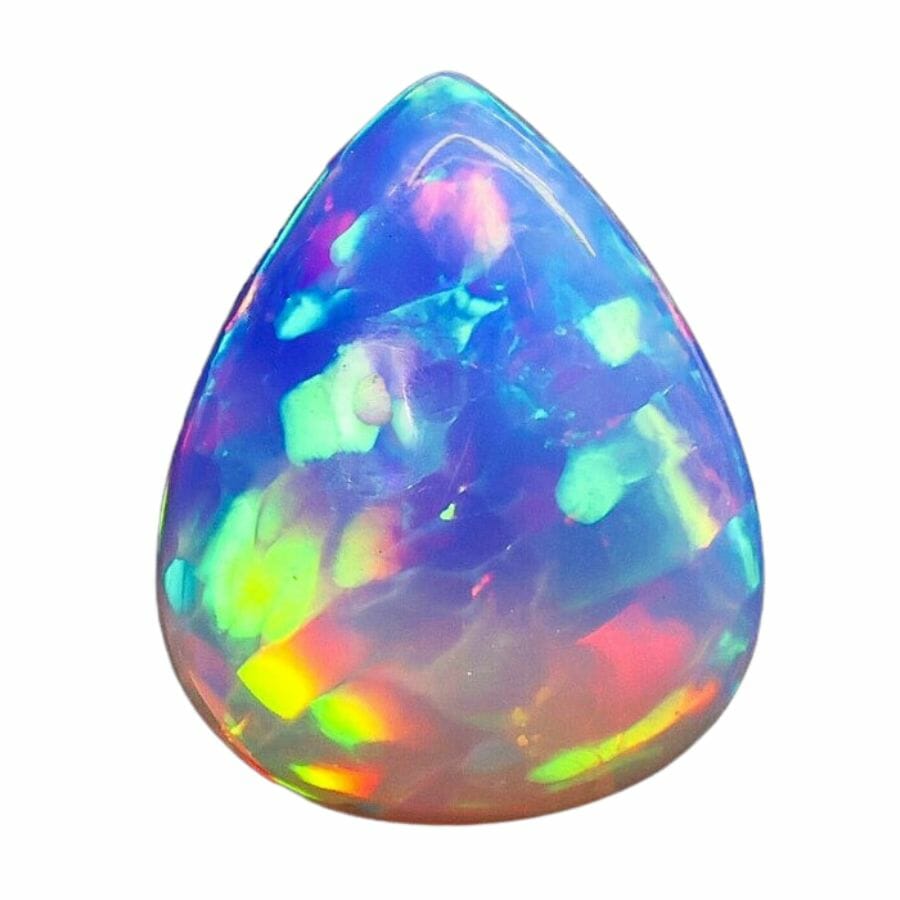 pear opal cabochon with blue, purple, green, yellow, pink, and purple specks