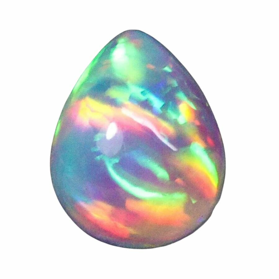 pear cut opal cabochon with green, yellow, orange, red, and purple swirls