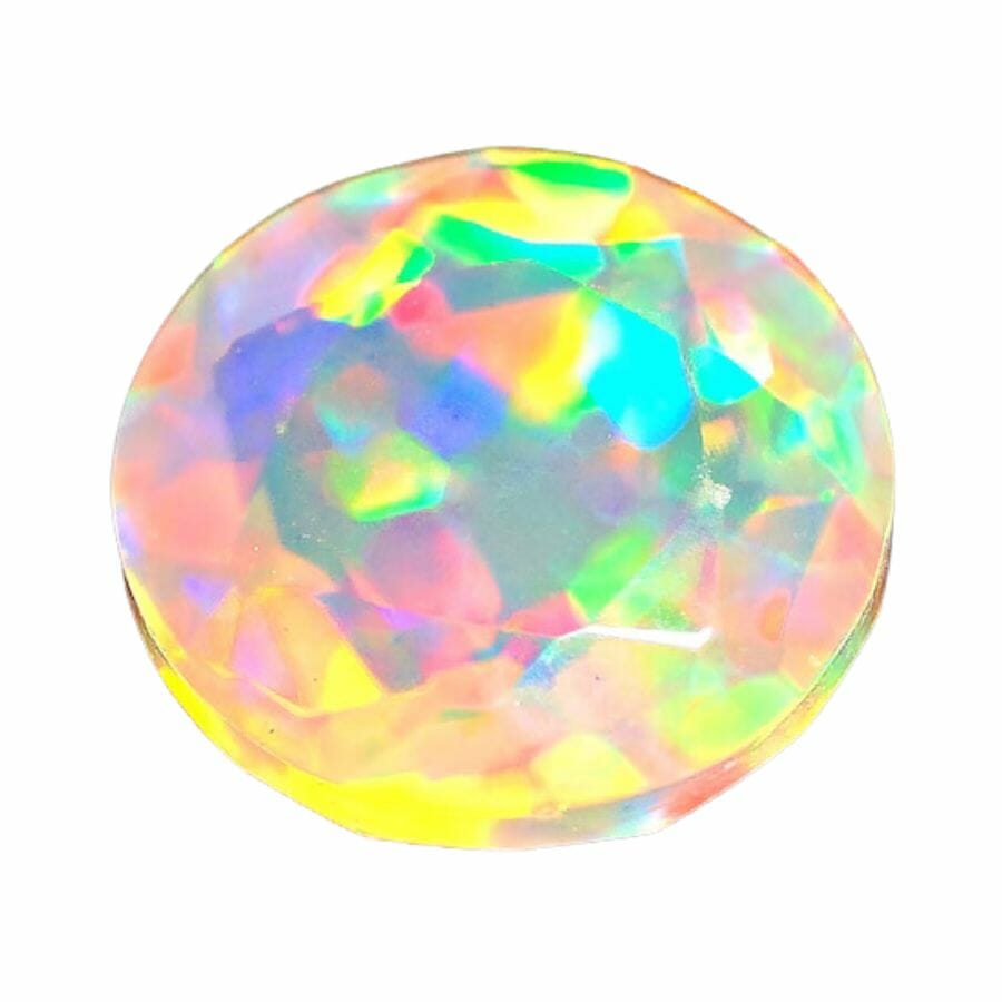 round faceted opal with yellow, red, purple, and green specks