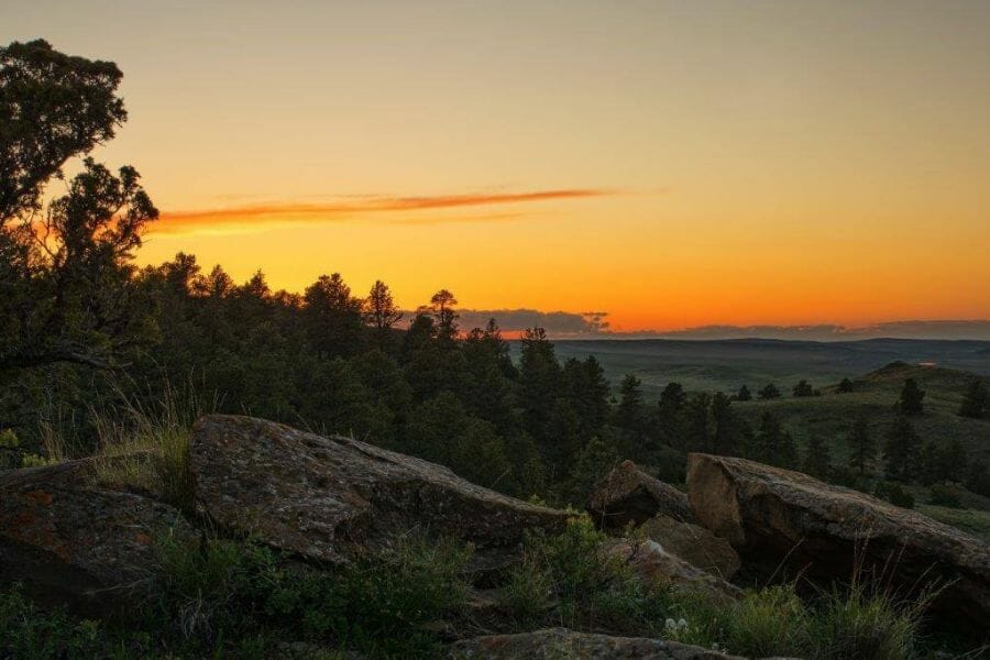 sunset over the forests and hills in Rosebud County, Montana