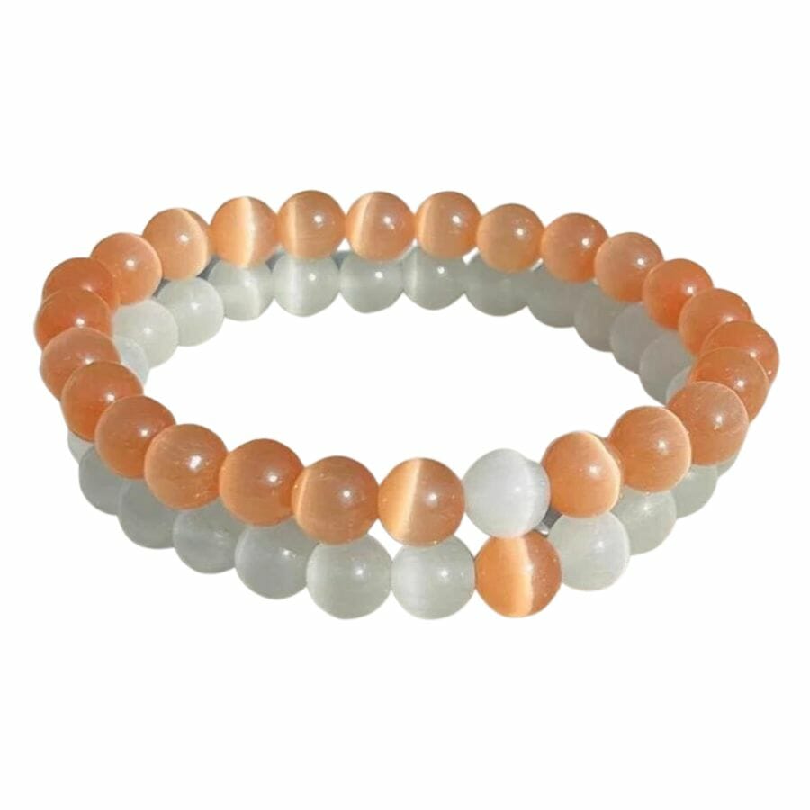 two bracelets with white and peach selenite beads