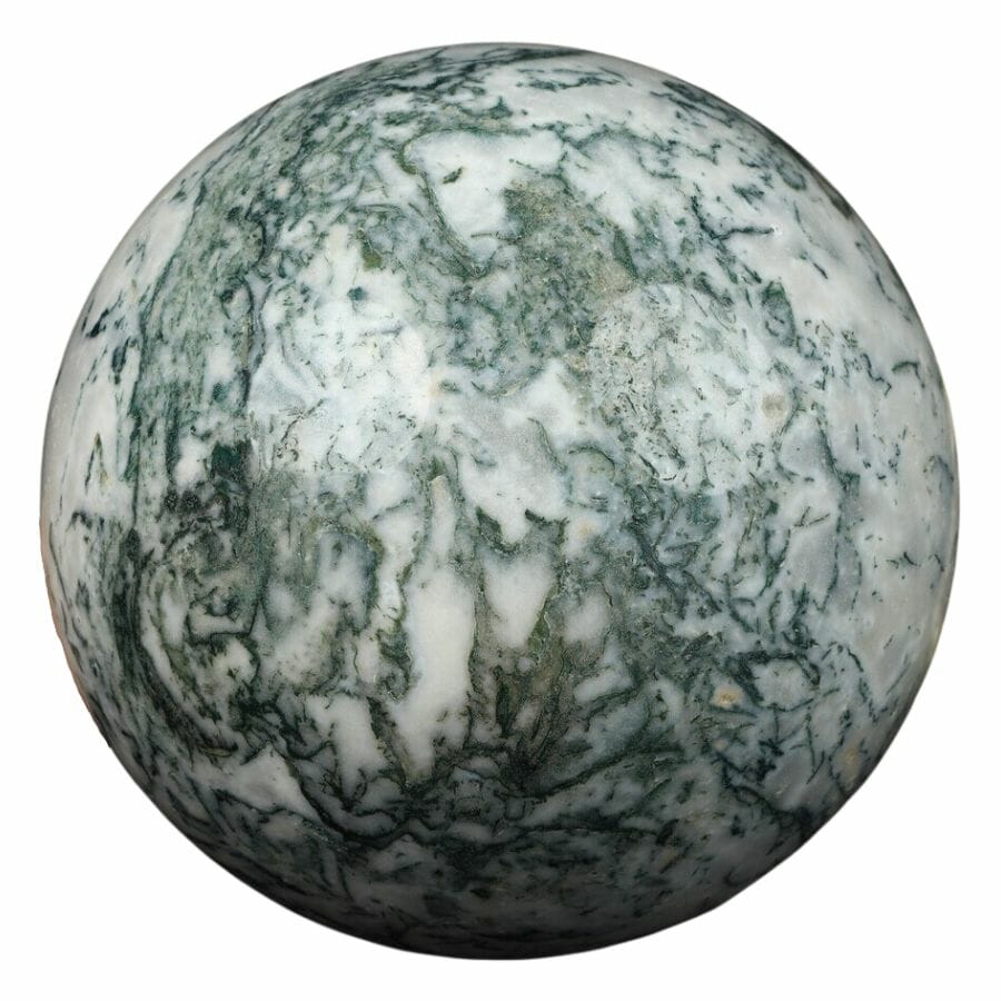 tree agate sphere with white base and green dendritic patterns