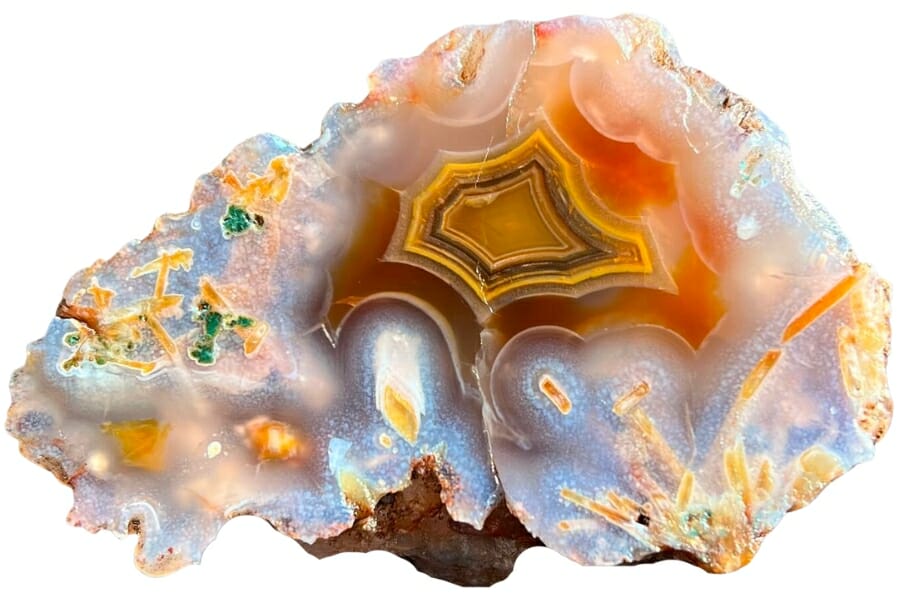 A beautiful pseudomorphs agate with interesting bands of yellow, brown, orange, and white