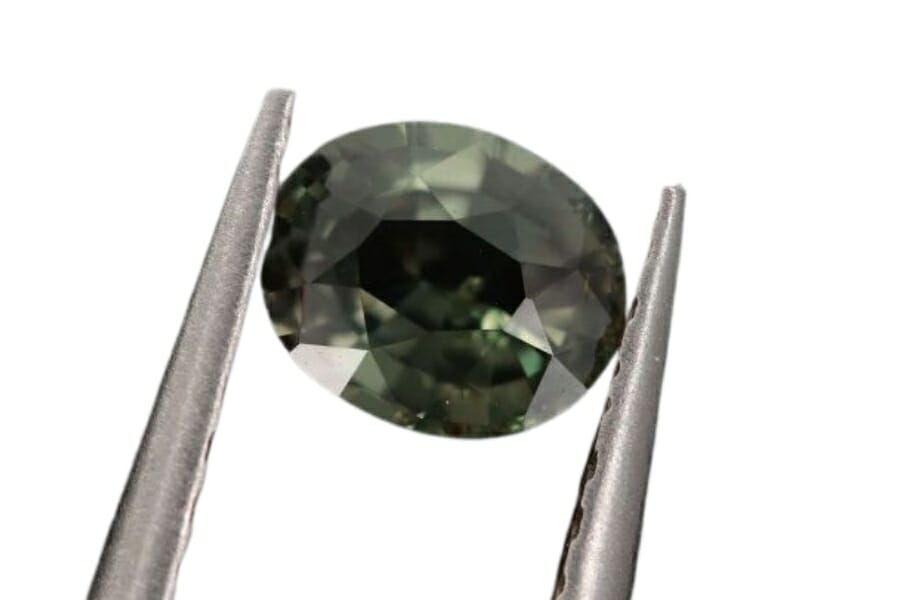 Appraising an oval-shaped alexandrite gemstone