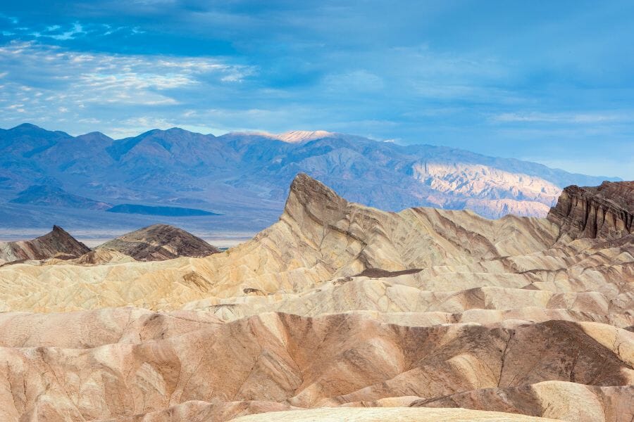 peaks of the mountains in the Amargosa Range with the blue sky in the background