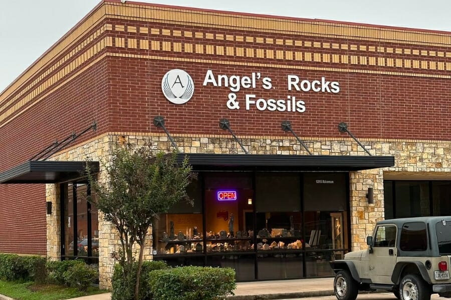 A look at the building and front store window of Angel's Rocks & Fossils