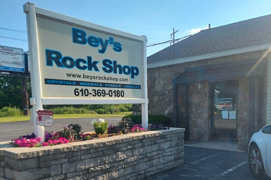 A look at the signage and front door of Bey's Rock Shop