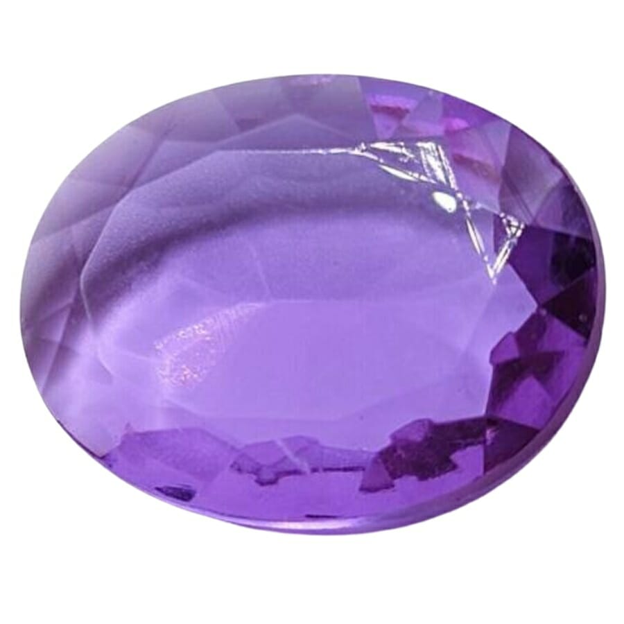 A gorgeous oval-shaped purple colored glass 