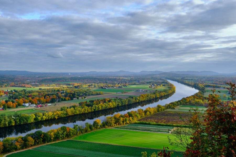 green fields and trees in Massachusetts lining the Connecticut River