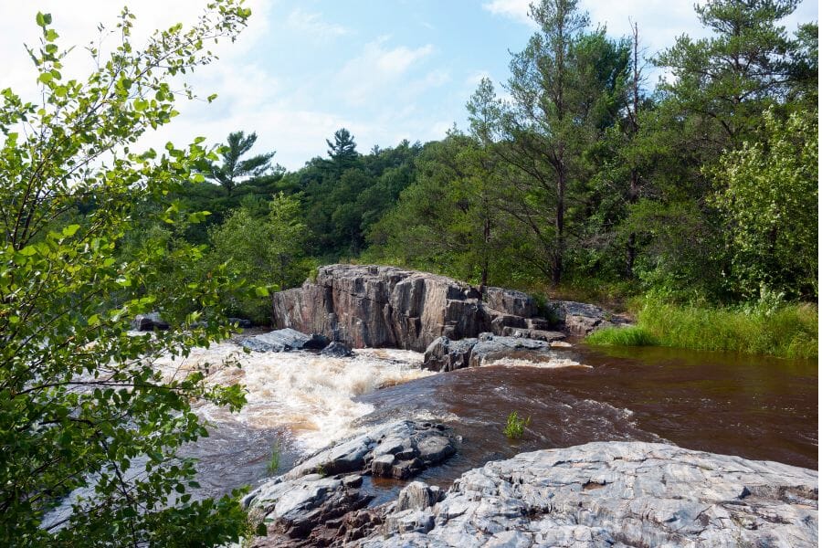 Eau Claire River with rocks and trees