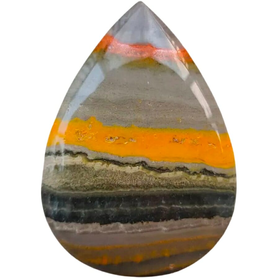 Bumblebee jasper cabochon displaying colors of gray, yellow, black, brown, and cream